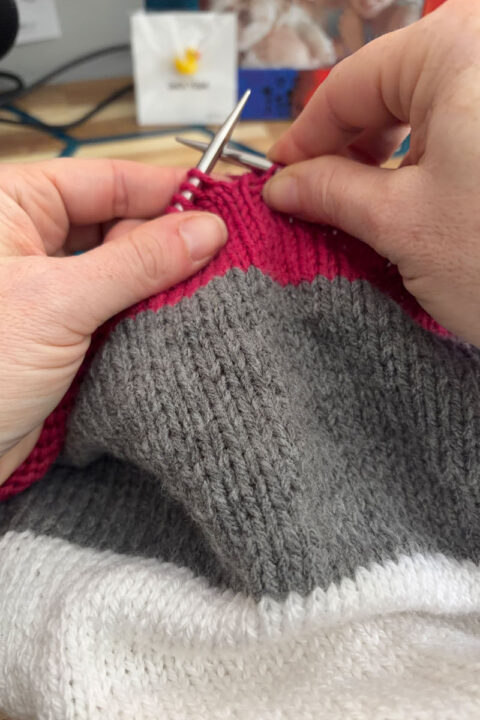 what is a maker? Person knitting